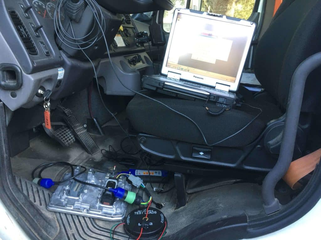 An electrical diagnostic machine hooked up to a truck at RDI Power