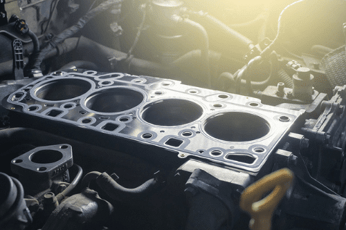 We perform custom fabrication services like head gasket replacement on a turbocharged engine, pictured here.