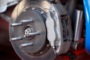 The Benefits of Checking Your Vehicle's Brakes Frequently by RDI Power in Brooksville, FL. Image of a car brake caliper.
