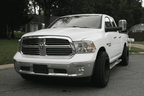 Oil Leak Repairs in Brooksville, FL by RDI Power. Image of a white 2014 Dodge Ram parked, highlighting the common oil leak problems and the importance of timely repairs to prevent engine damage and maintain vehicle performance.